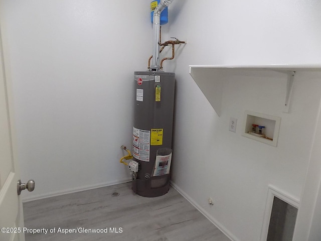 33 Angelica Cir, Parachute, CO 81635 - utility room featuring gas water heater