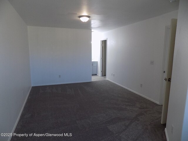 33 Angelica Cir, Parachute, CO 81635 - carpeted empty room featuring baseboards
