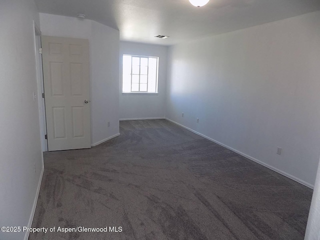 33 Angelica Cir, Parachute, CO 81635 - carpeted spare room with baseboards