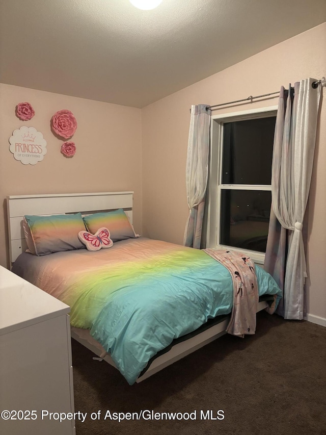 5033 County Road 335 Unit 112, New Castle, CO 81647 - carpeted bedroom with lofted ceiling