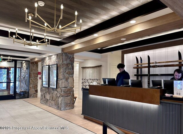 300 Carriage Way Unit 521, Snowmass Village, CO 81615 - reception with a chandelier