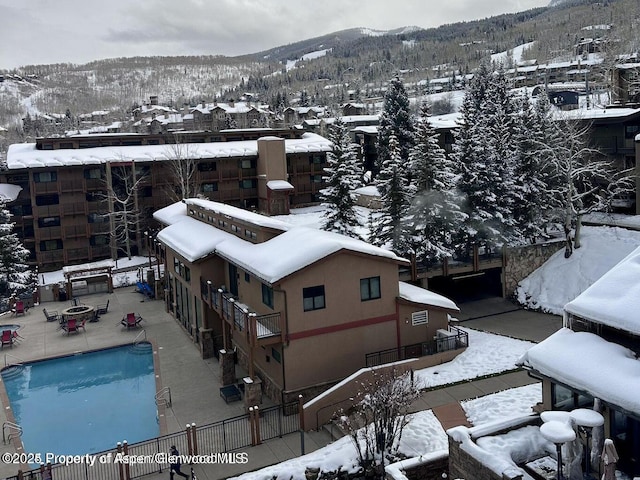 300 Carriage Way Unit 521, Snowmass Village, CO 81615 - snowy aerial view with a mountain view