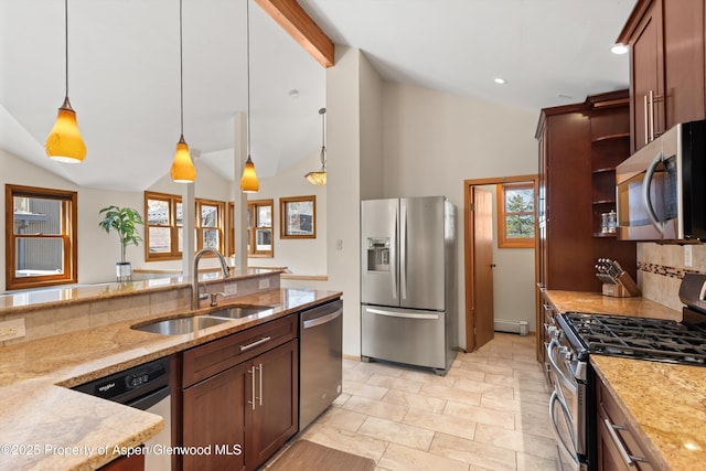 534/536 Spruce St, Aspen, CO 81611 - kitchen featuring stainless steel appliances, pendant lighting, light stone counters, a baseboard radiator, and open shelves