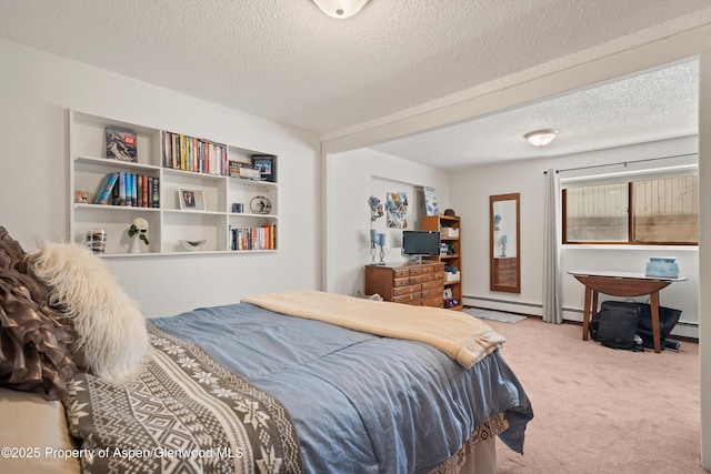 534/536 Spruce St, Aspen, CO 81611 - carpeted bedroom with a textured ceiling and baseboard heating