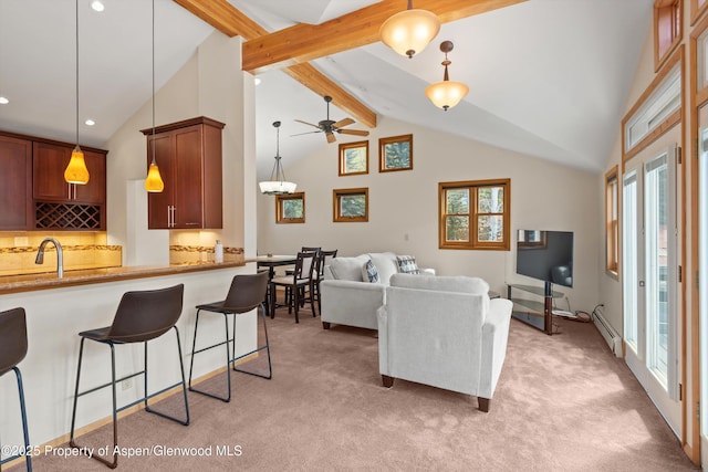 534/536 Spruce St, Aspen, CO 81611 - living room featuring baseboard heating, a ceiling fan, light carpet, and recessed lighting