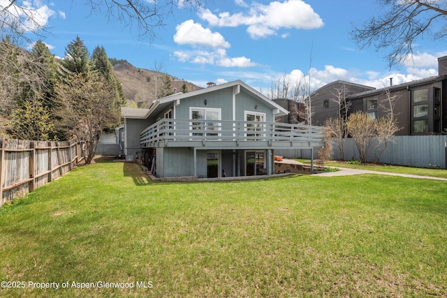 534/536 Spruce St, Aspen, CO 81611 - back of property featuring a wooden deck and a fenced backyard