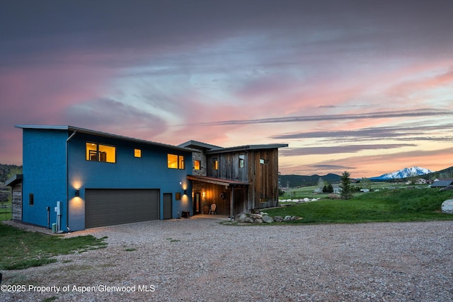 103 Ranch Ln, Glenwood Springs, CO 81601 - view of front of house with gravel driveway and a mountain view