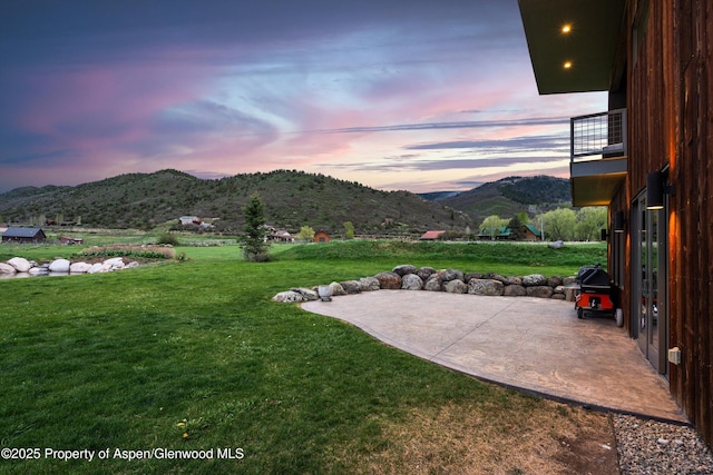 103 Ranch Ln, Glenwood Springs, CO 81601 - view of grassy yard featuring a balcony, a patio area, and a mountain view