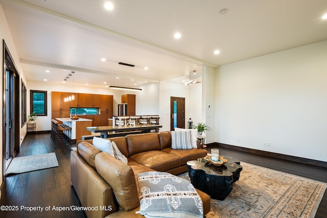 103 Ranch Ln, Glenwood Springs, CO 81601 - living room with dark wood-type flooring, baseboards, and recessed lighting