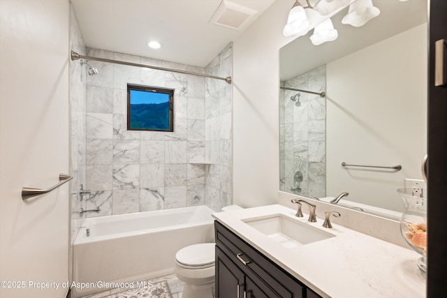 103 Ranch Ln, Glenwood Springs, CO 81601 - bathroom with toilet, marble look tiles, vanity,  shower combination, and recessed lighting