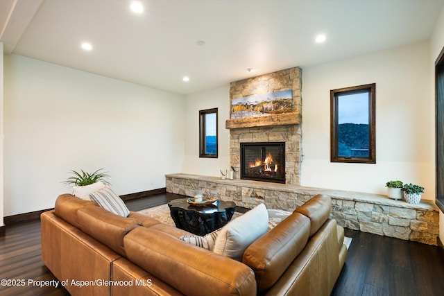 103 Ranch Ln, Glenwood Springs, CO 81601 - living room featuring a stone fireplace, wood finished floors, recessed lighting, and baseboards