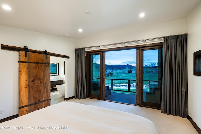 103 Ranch Ln, Glenwood Springs, CO 81601 - carpeted bedroom featuring a barn door, access to outside, recessed lighting, and baseboards