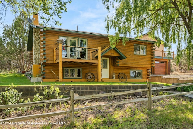 log home with a balcony