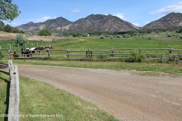 view of mountain feature with a rural view