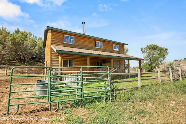 exterior space featuring an outbuilding