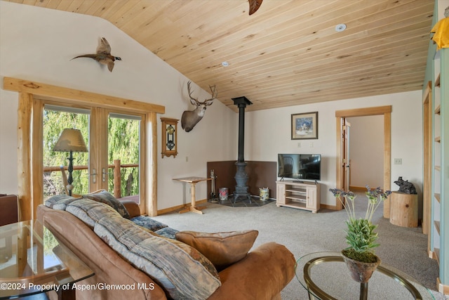 living room with french doors, wooden ceiling, carpet floors, a wood stove, and lofted ceiling