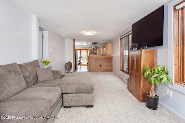 living room featuring light colored carpet