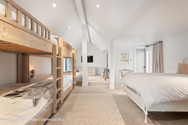 bedroom with light carpet and lofted ceiling with beams