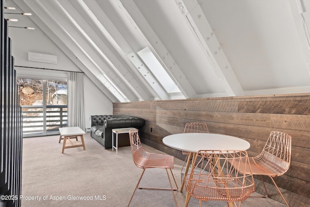 sitting room featuring wood walls, carpet, lofted ceiling, and a wall mounted air conditioner