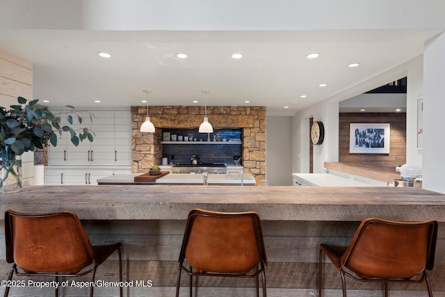 bar with decorative light fixtures