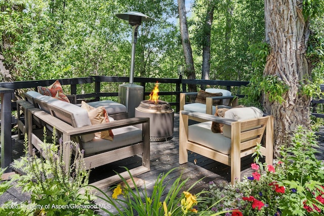 373 Sopris Creek Rd Unit 6, Basalt, CO 81621 - wooden deck featuring a fire pit
