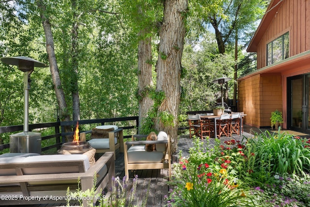 373 Sopris Creek Rd Unit 6, Basalt, CO 81621 - deck with outdoor dining area and an outdoor fire pit