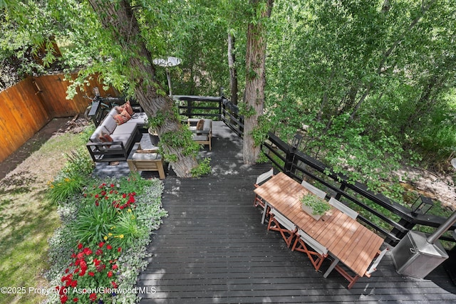 373 Sopris Creek Rd Unit 6, Basalt, CO 81621 - wooden terrace with an outdoor hangout area and a fenced backyard