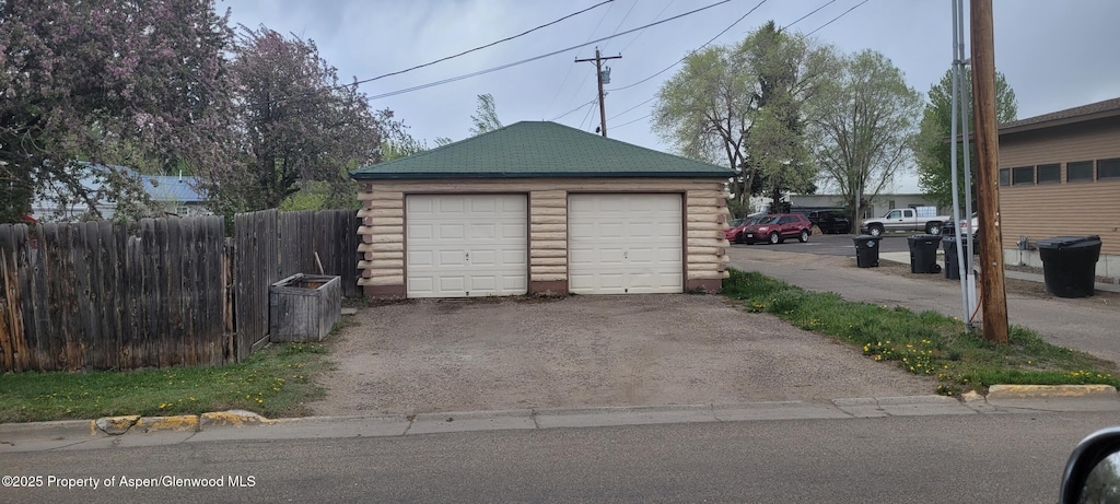 586 Tucker St, Craig, CO 81625 - detached garage with fence