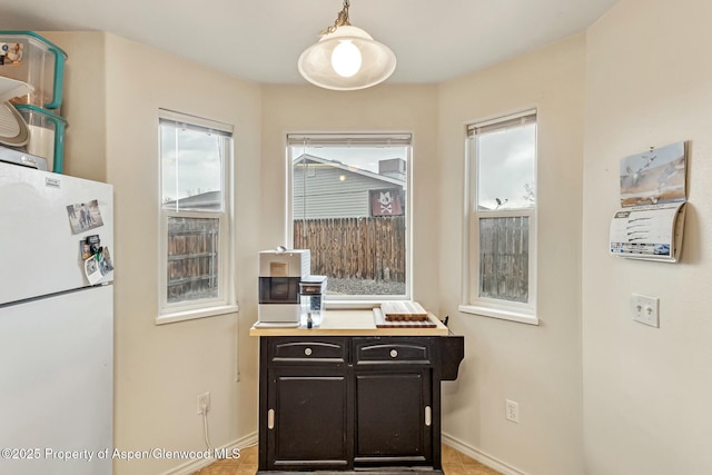 interior space with baseboards