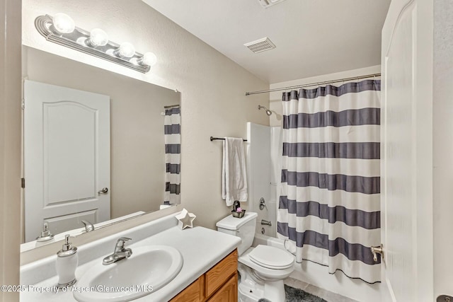 full bath featuring shower / bath combo, visible vents, vanity, and toilet