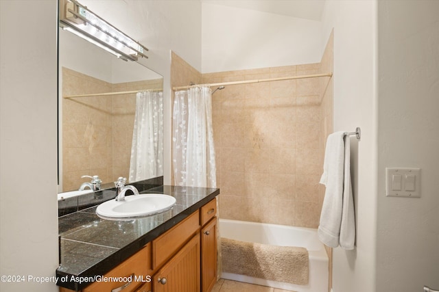 bathroom featuring shower / bath combination with curtain and vanity