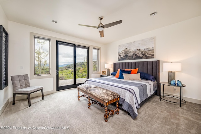 bedroom featuring access to outside, carpet flooring, ceiling fan, and baseboards