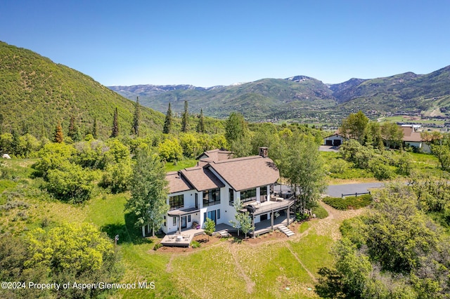 aerial view featuring a mountain view