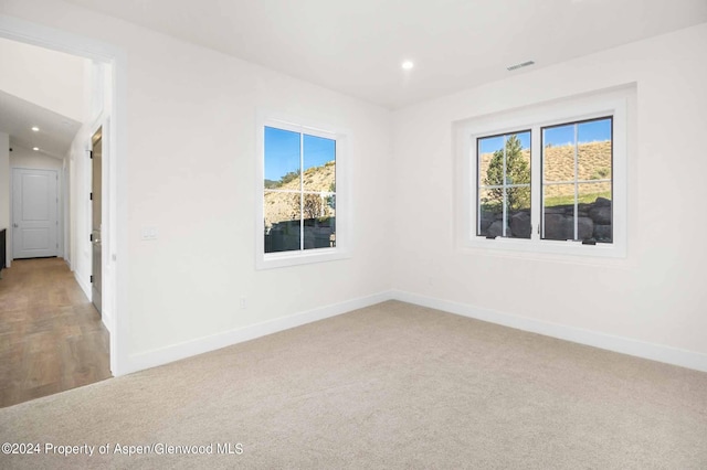 view of carpeted spare room