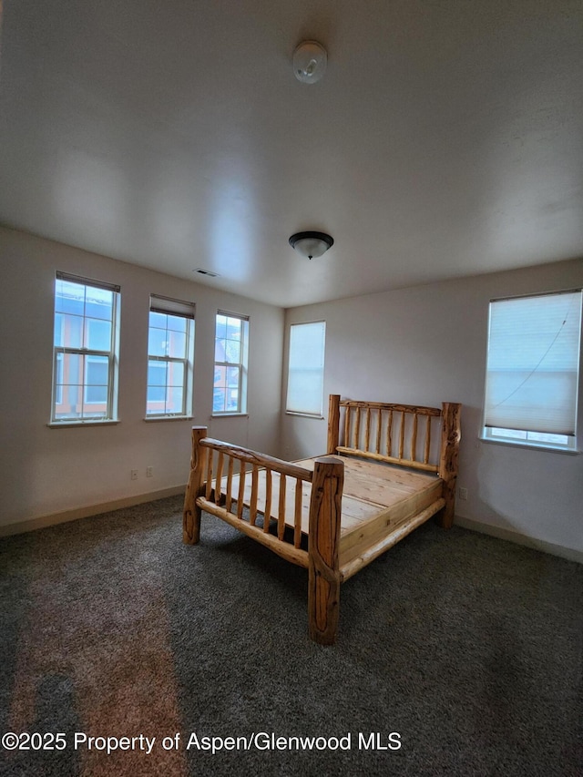 bedroom featuring carpet