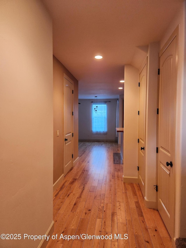 hallway featuring light hardwood / wood-style floors