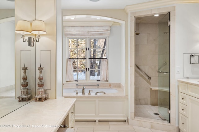 bathroom with vanity, tile patterned floors, and independent shower and bath