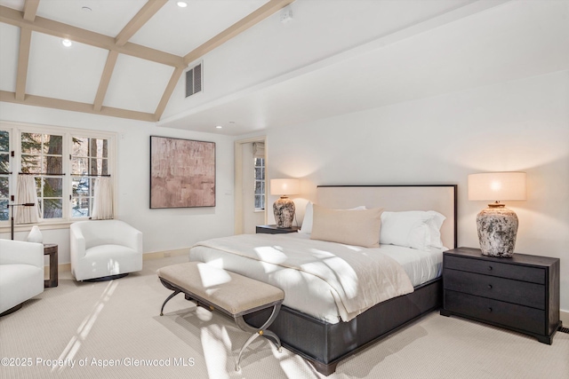 bedroom featuring vaulted ceiling with beams and carpet floors