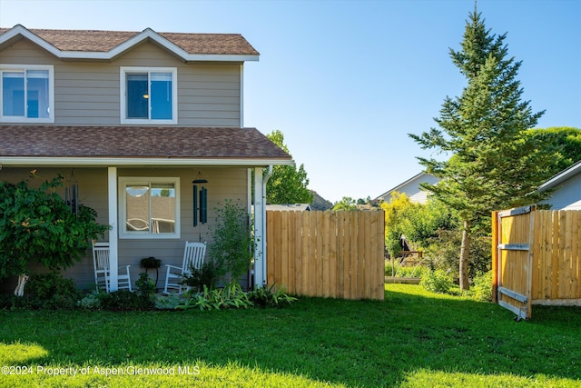 exterior space with a front lawn