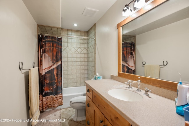 full bathroom featuring tile patterned flooring, vanity, shower / bath combo, and toilet