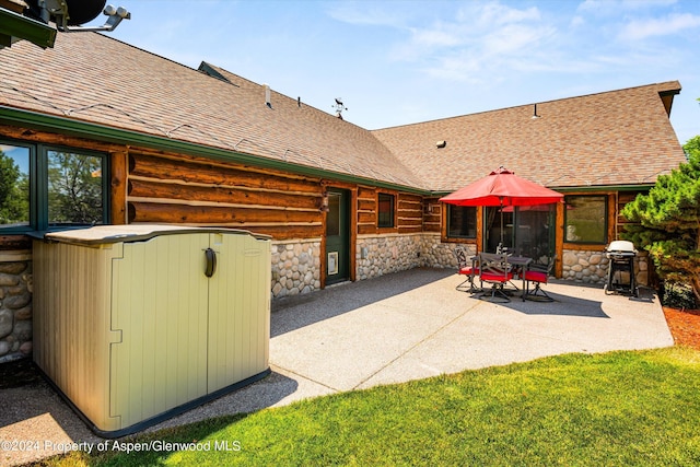 view of patio / terrace with a grill