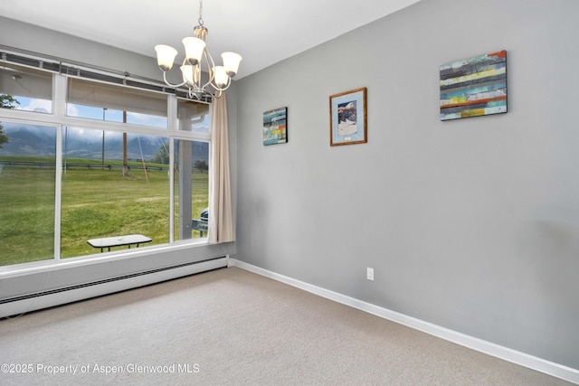 156 Limberpine Cir, Parachute, CO 81635 - unfurnished room with a baseboard heating unit, a chandelier, plenty of natural light, and baseboards