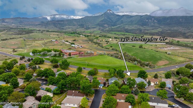 156 Limberpine Cir, Parachute, CO 81635 - aerial overview of property's location with mountains and property boundaries highlighted