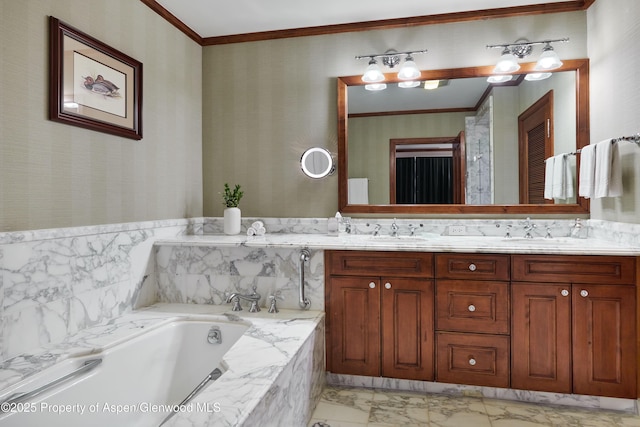 bathroom featuring a garden tub, a sink, double vanity, and crown molding