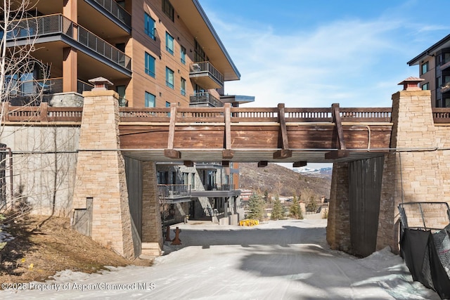 view of building exterior with a mountain view