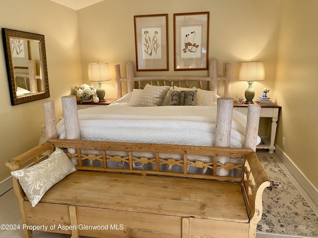 bedroom featuring hardwood / wood-style floors