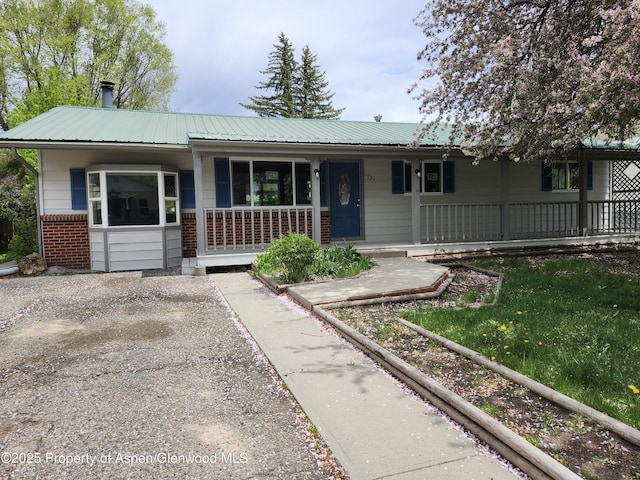 737 Rose St, Craig, CO 81625 - ranch-style house featuring brick siding and covered porch