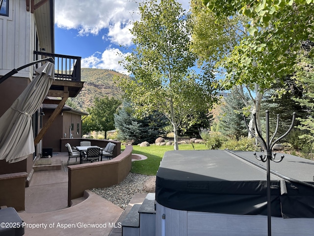 86 Sunrise Ct, Glenwood Springs, CO 81601 - view of yard with a hot tub, a patio area, and a mountain view
