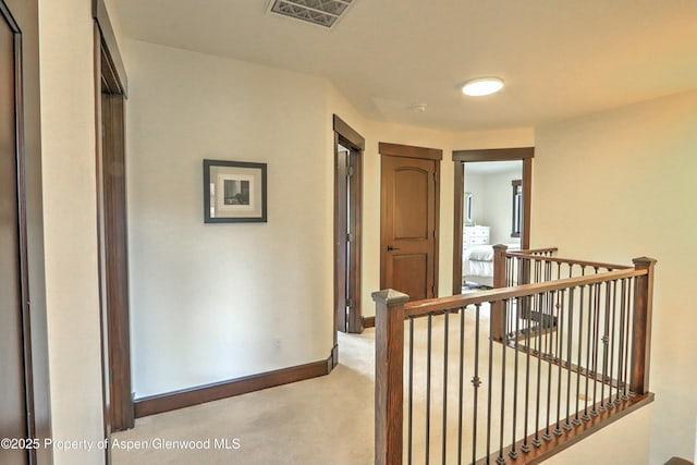 86 Sunrise Ct, Glenwood Springs, CO 81601 - corridor with an upstairs landing and light carpet