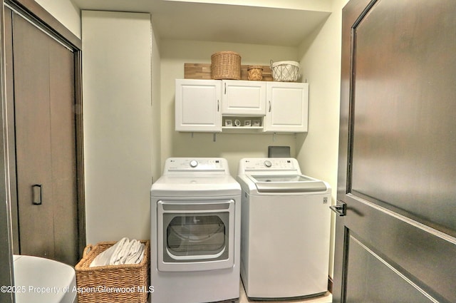 86 Sunrise Ct, Glenwood Springs, CO 81601 - laundry area featuring cabinet space and washing machine and clothes dryer